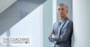 Happy Client in suit leaning against wall