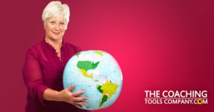 retiree holding globe against red background