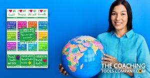 Person holding globe with World Mental Health Day Graphics alongside on blue backgroundMental