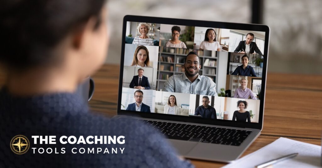 Coach attending an online session on a laptop, focused and engaged in a virtual learning environment.